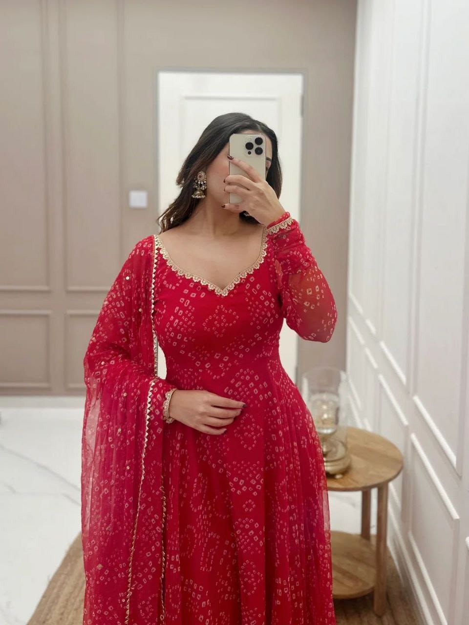 red bandhani gown for women with scalloped neckline long sleeves matching dupatta and gold trim