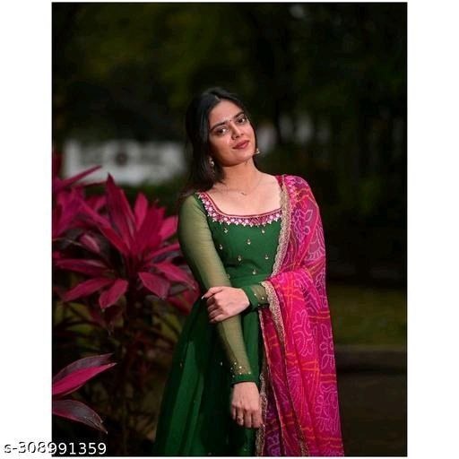 Young woman in green embroidered georgette gown kurta with dupatta in pink print and sheer long sleeves