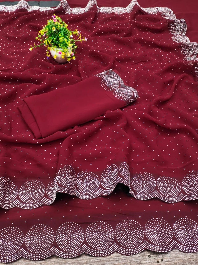 red georgette embellished saree with silver stone dotted pattern, scalloped embellished border and matching blouse piece