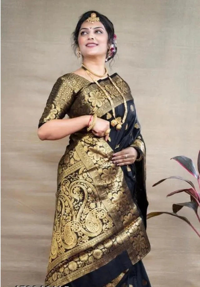 Model wearing Banarasi silk saree royal blue with intricate gold zari brocade and traditional jewelry