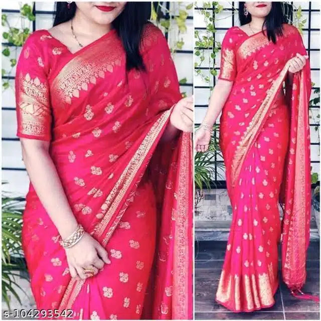 Woman modeling red Banarasi silk saree with blouse featuring gold zari motifs and matching elbow length blouse for festive wear