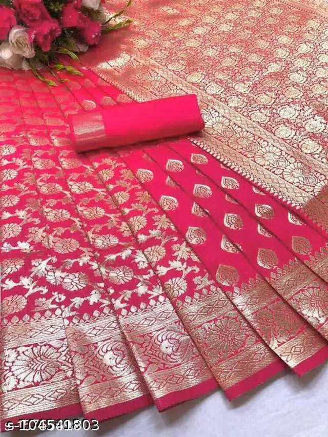 Bright pink Banarasi silk saree with blouse featuring gold zari floral motifs and wide woven border