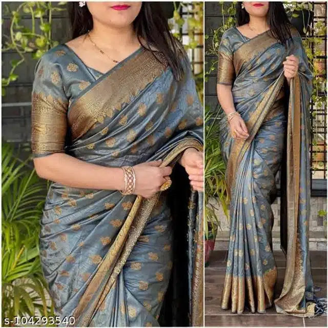 Banarasi silk saree with blouse in slate blue with gold zari motifs and broad gold border modeled by woman