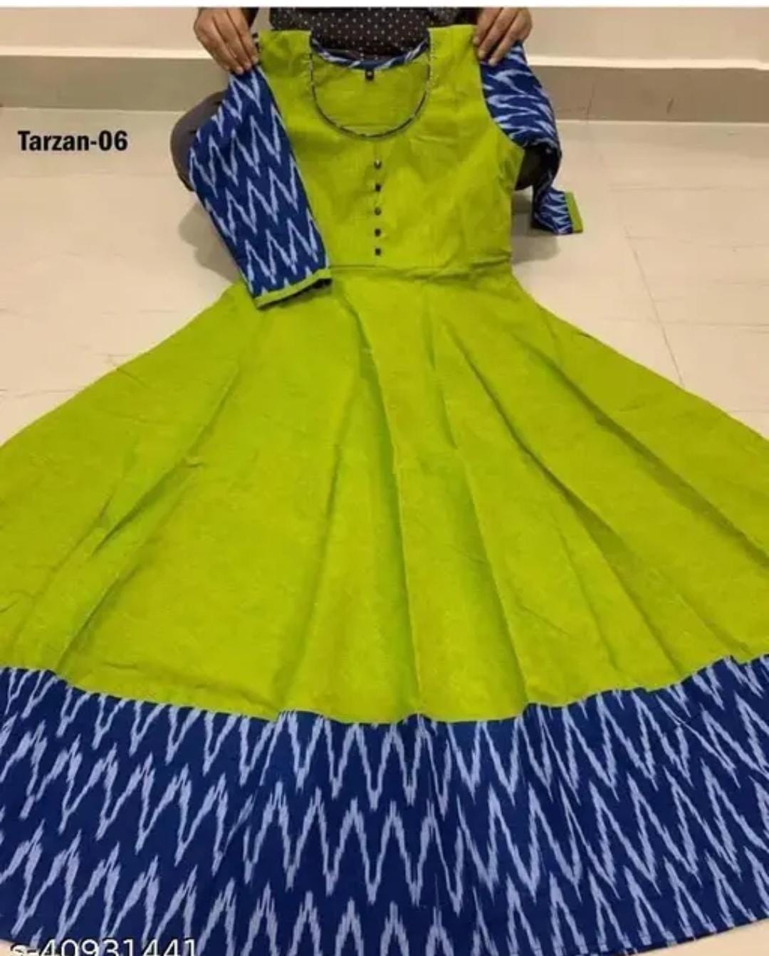 Lime green flared gown with blue ikat hem and sleeves and round neck buttons and necklace classic designer gown for women
