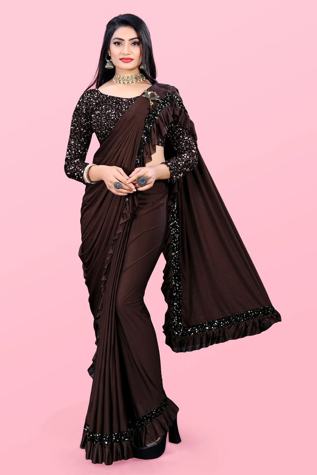 Woman wearing an affordable party wear saree for women in dark brown with sequin blouse and ruffle detailing