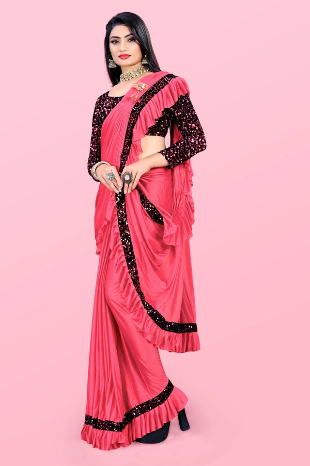 Affordable party wear saree for women in pink with black sequin border and full sleeve blouse