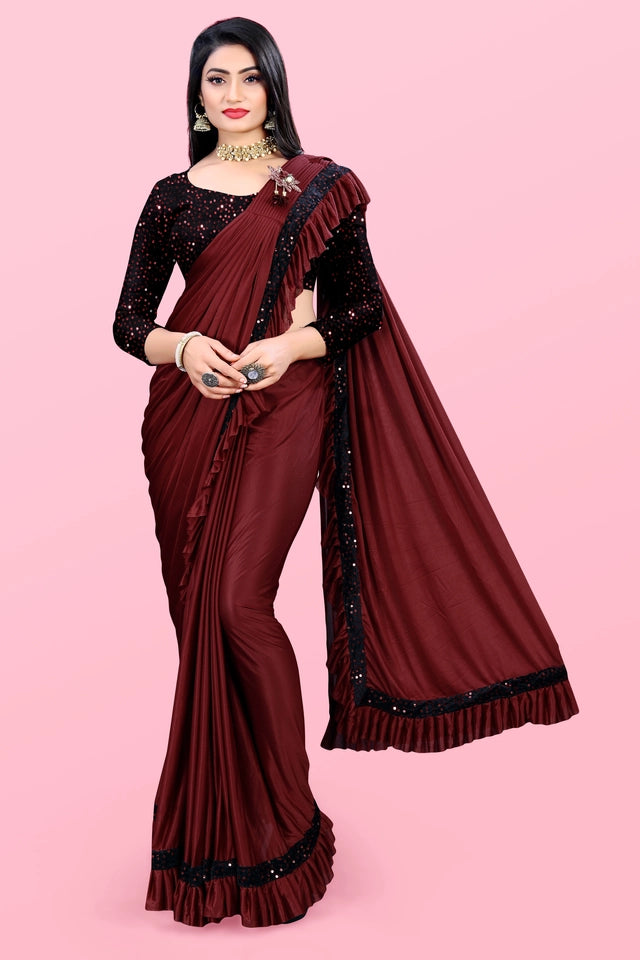 Woman wearing an affordable party wear saree for women in maroon with black sequin blouse