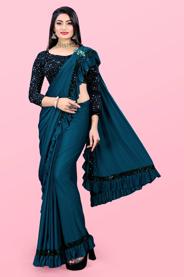 Affordable party wear saree for women in teal with black sequin blouse and ruffle detailing