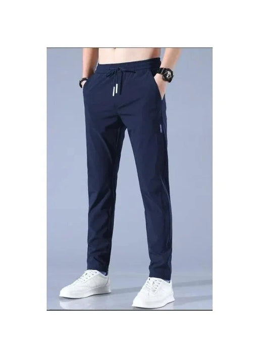 Navy blue lycra track pants for men with drawstring waist and tapered fit