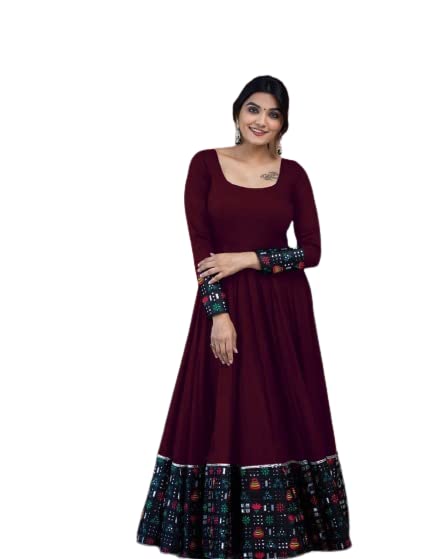 Maroon scoop neck long sleeve gown with printed hem and cuffs worn by model solid pattern stitched gown for women