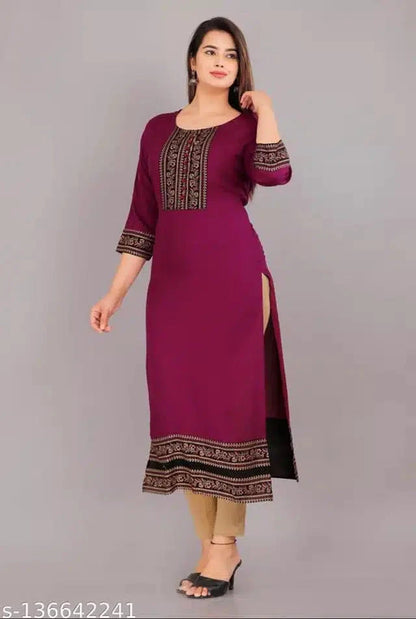 Woman wearing maroon designer rayon kurti for women with printed borders and side slit
