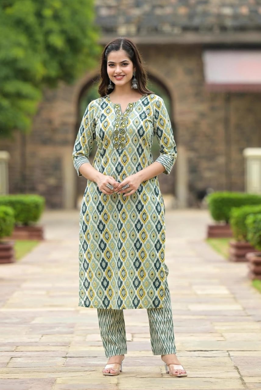 Woman modeling green diamond print viscose rayon kurta pant dupatta set with three quarter sleeves and straight pants