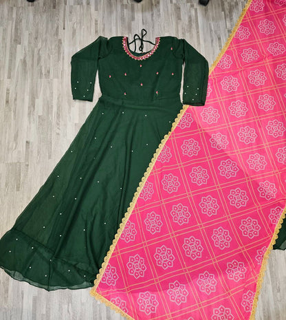 Dark green embroidered long sleeve georgette gown kurta with dupatta paired with pink patterned dupatta with gold trim