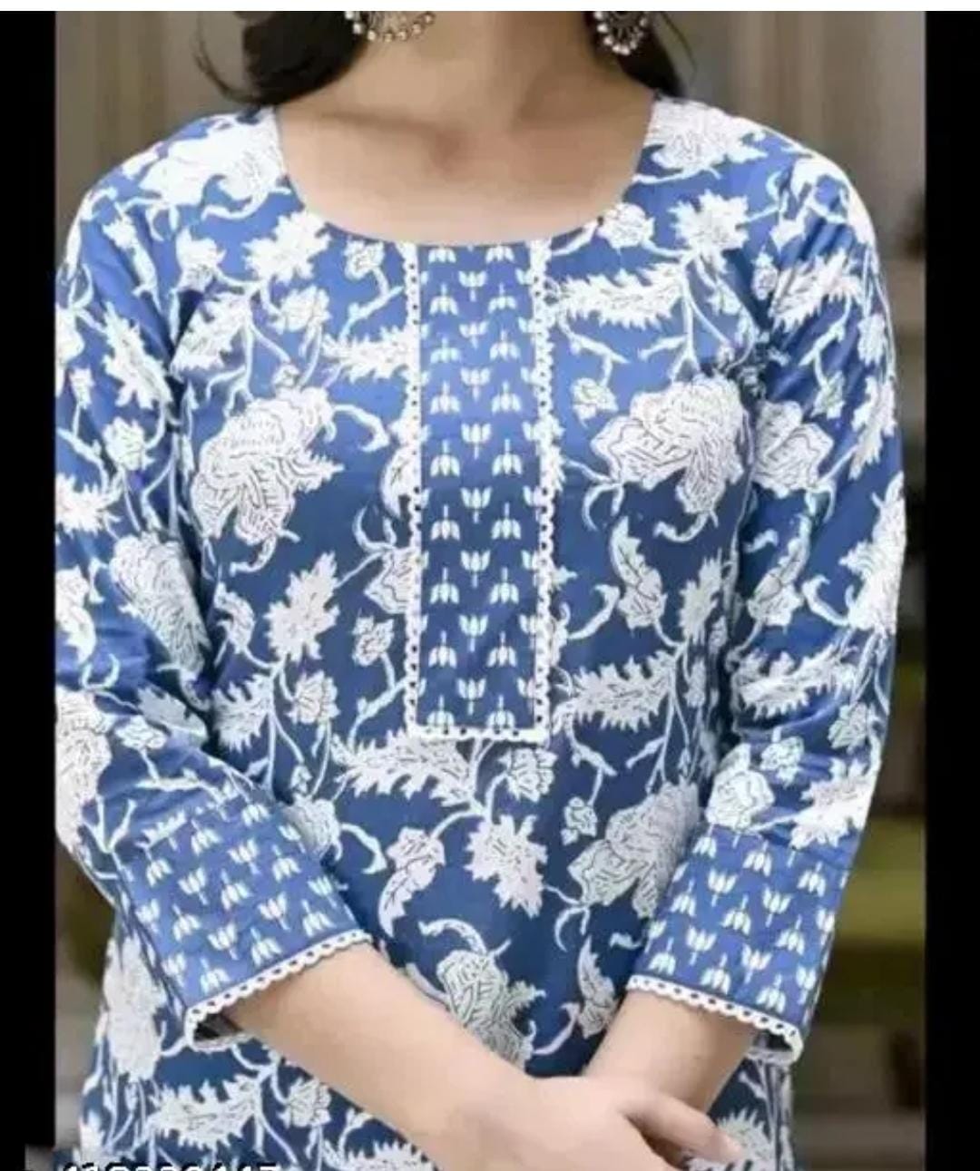 Blue and white floral print women round neck kurta with pants featuring three quarter sleeves and lace cuffs