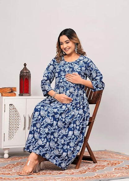 Smiling woman wearing a blue and white floral printed kurti for women sitting on a wooden chair