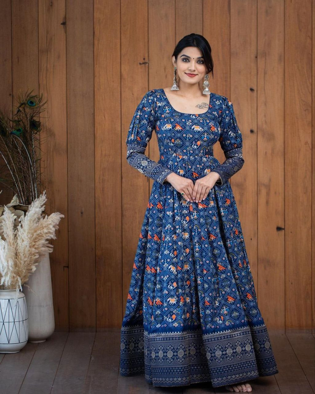 Elegant blue printed georgette gown for women with full sleeves and traditional floral patterns