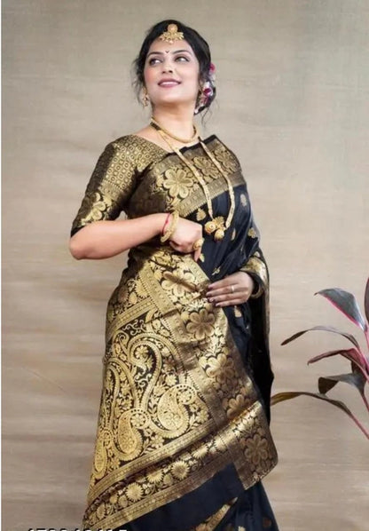 Model wearing Banarasi silk saree royal blue with intricate gold zari brocade and traditional jewelry
