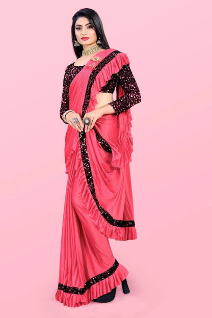 Affordable party wear saree for women in pink with black sequin blouse and ruffle border