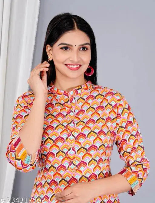 Woman wearing colorful stylish Indian kurta sets with geometric patterns and button details
