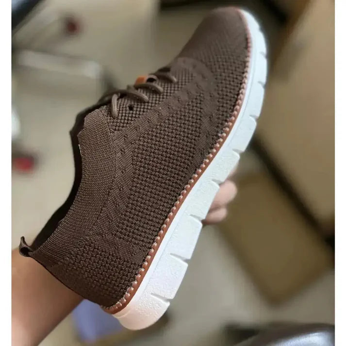 Brown mesh casual shoes for men with white soles and breathable knit fabric design